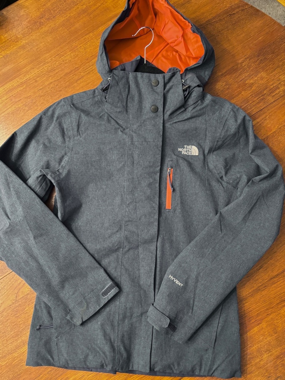 The North Face navy rain Jacket with Orange Lining
